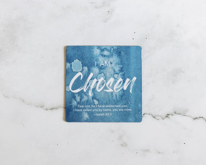 A Blue and white magnet that says I Am Chosen with a bible verse from Isaiah 43:1 on a white marble background that says Fear Not, for I have redeemed you; I have called you by name, you are mine.