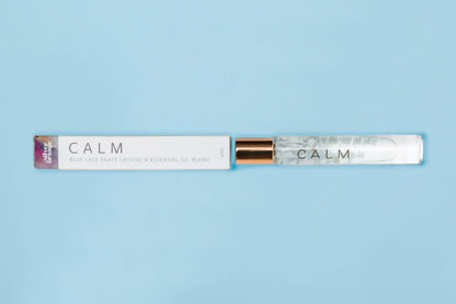 Roll-on bottle labeled 'CALM' on a light blue background